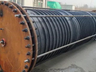 Reinforced PE composite pipe with a flange assembly for a test setup